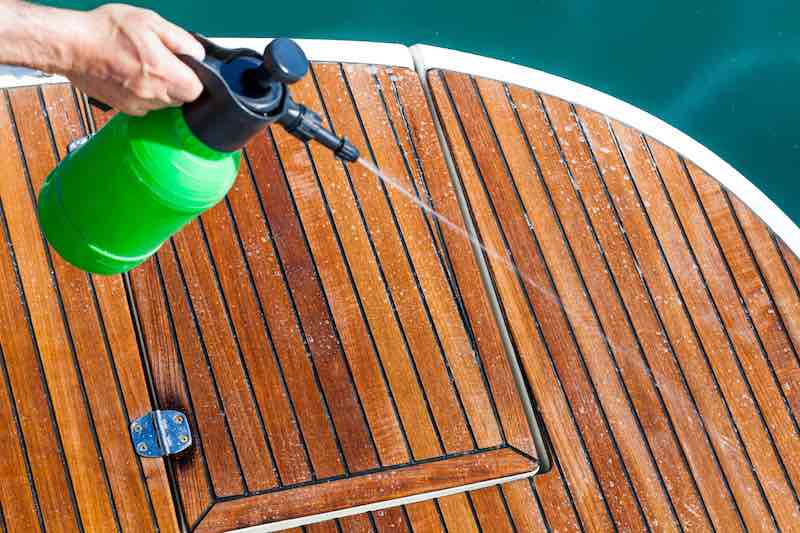 Preparing a wooden dock to be cleaned