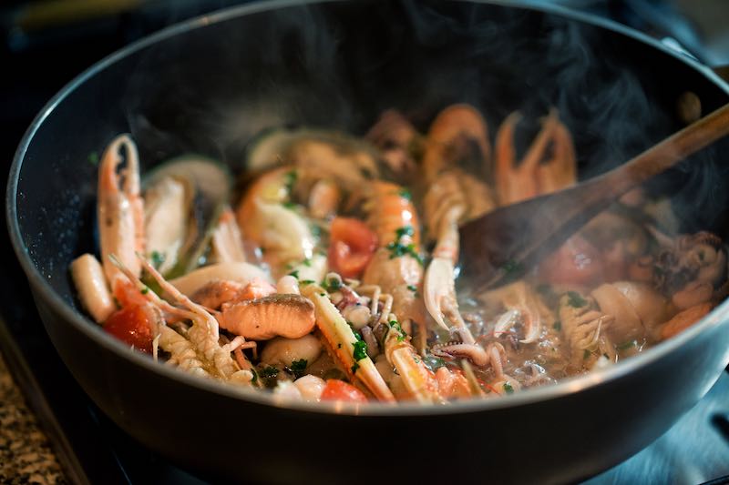 Seafood being cooked on a frying pan, Personal hygiene
